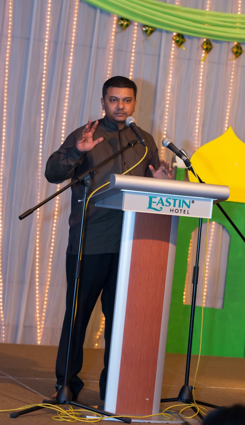 Speaker addressing guests at a podium